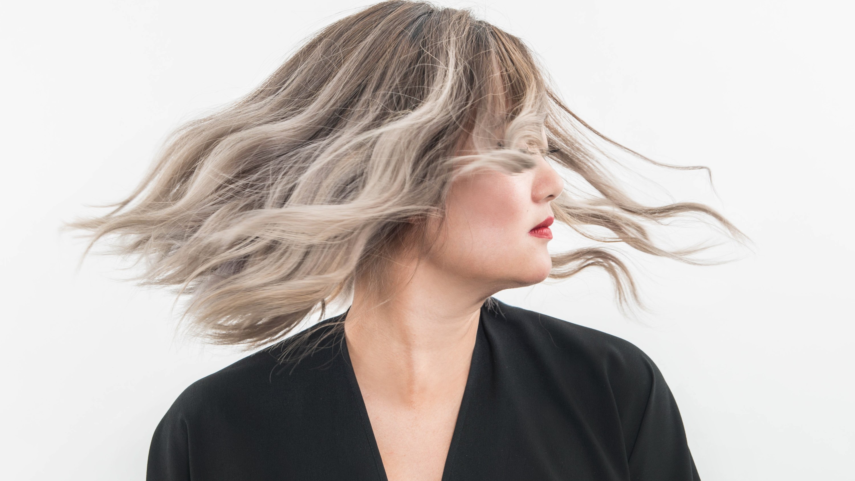 What You Should Know Before Dyeing Your Hair Gray