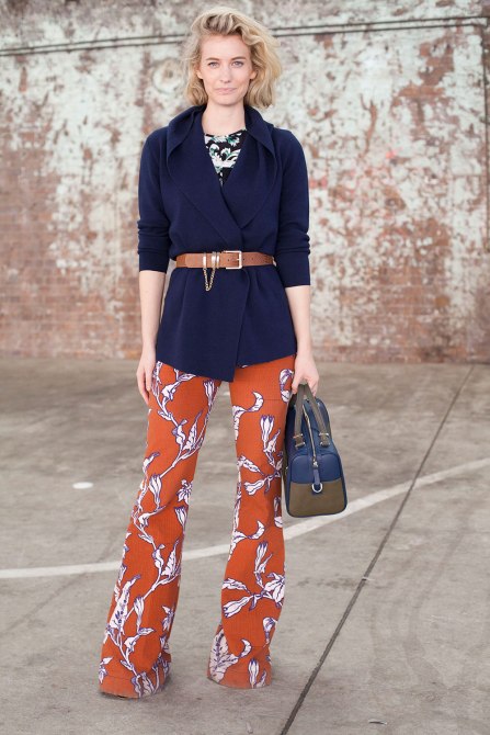 STYLECASTER | How to Wear Clashing Colors | Navy Coat with Orange Floral Printed Pants