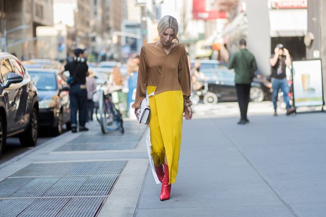 STYLECASTER | How to Wear Clashing Colors | Yellow and Brown Dress with Red Boots