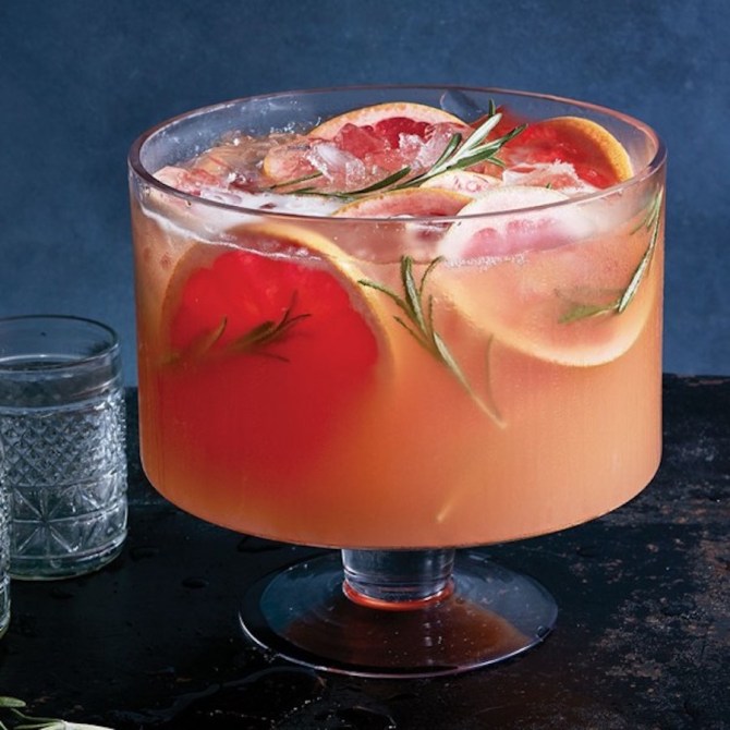 12 Big-Batch Punch Recipes That'll Get Everyone Drunk at Your Holiday Party: Red Grapefruit Sparkler