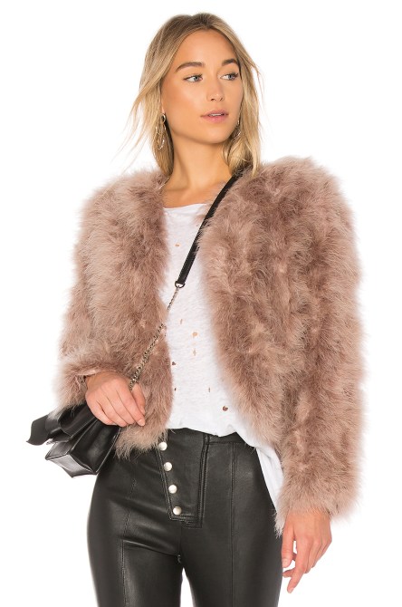 STYLECASTER | Feather Embellishments Are Replacing Last Year’s Sequin Trend For Holiday Parties