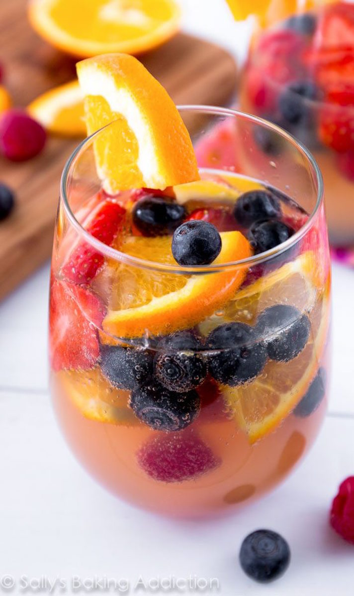 STYLECASTER | 11 Champagne Punch Recipes That'll Make Any Party More Fun | Sparkling Fruit Sangria