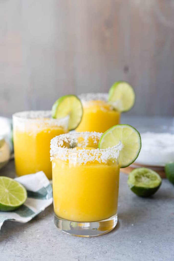 STYLECASTER | 17 Easy Blender Cocktails That Make Any Day Feel Like Vacation | Mango Margaritas