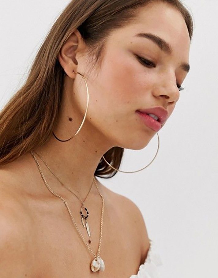 STYLECASTER | Hoop Earrings So Truly Massive You Could Probably Fit Your Head Through Them