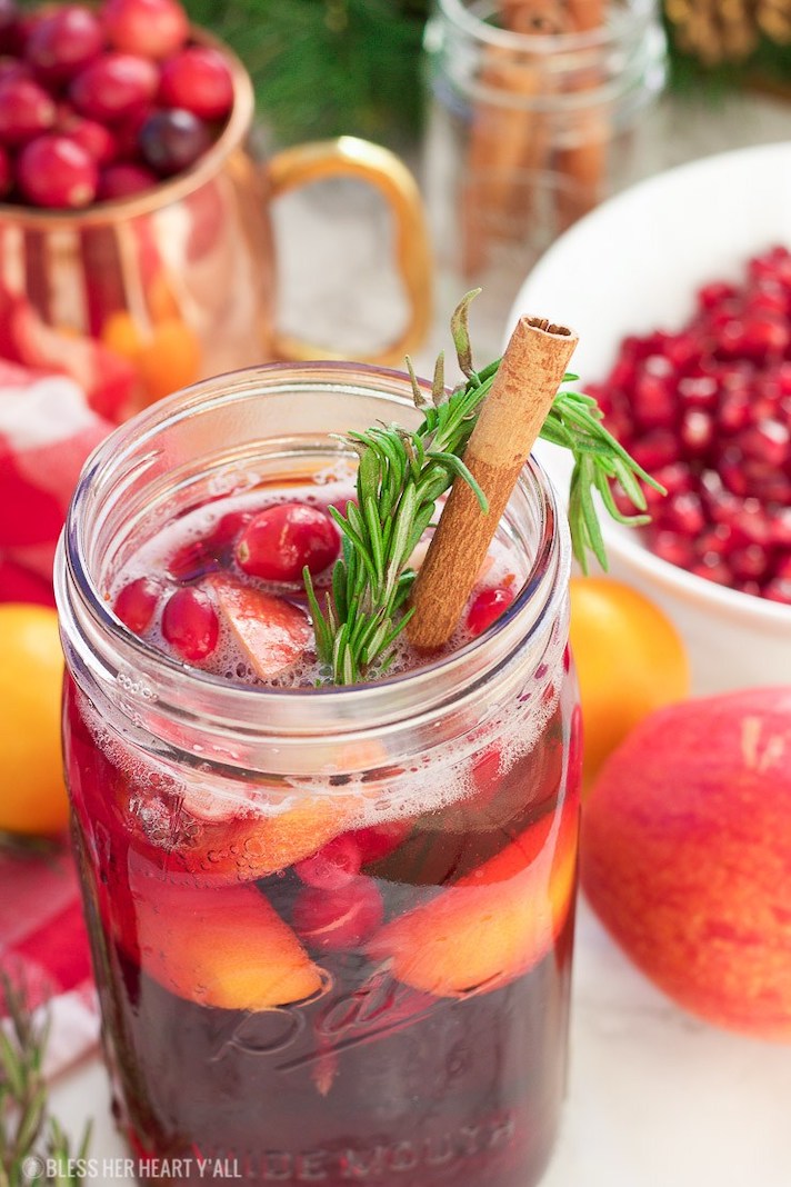 STYLECASTER | 15 Big-Batch Holiday Cocktails You Can Make With Boxed Wine | Winter Pomegranate Cranberry Sangria