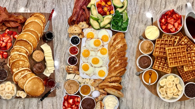 A table topped with several brunch boards