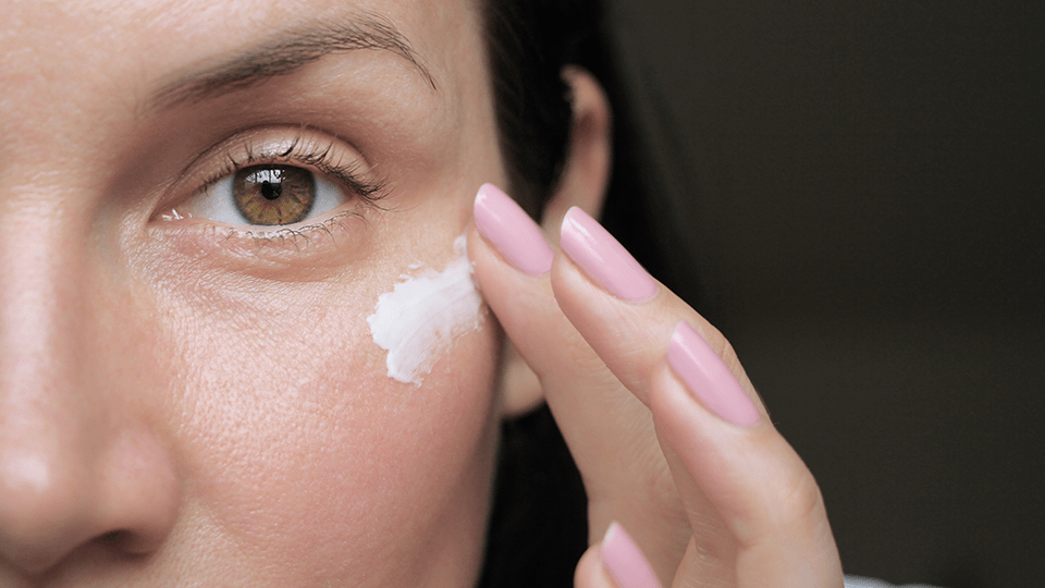 Applying eye cream Adobe