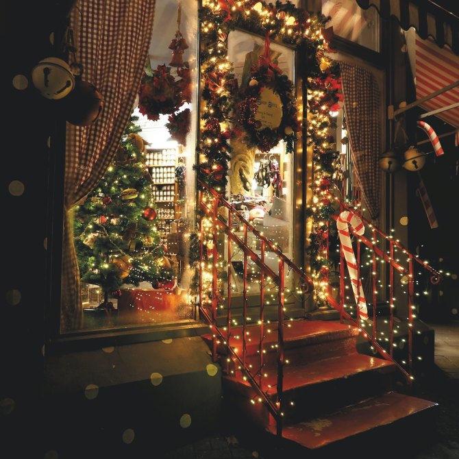The exterior of a home covered with holiday decor