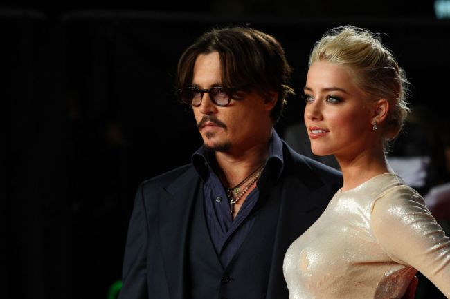Johnny Depp and Amber Heard attend The UK Premiere of 'The Rum Diary' at at Odean, Kensington on November 3, 2011 in London, England.