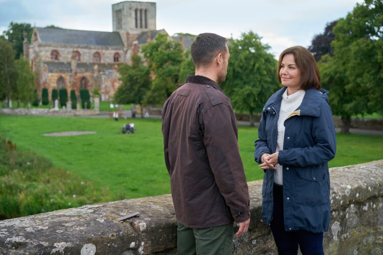 Erica Durance and Jordan Young in Hallmark's A Scottish Love Scheme