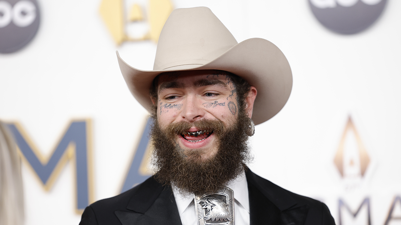 Post Malone. Post Malone in a cowboy hat attends the 57th Annual CMA Awards at Bridgestone Arena on November 08, 2023 in Nashville, Tennessee