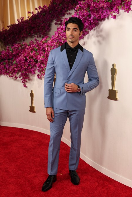 Taylor Zakhar Perez at the 2024 Oscars red carpet in a light blue suit
