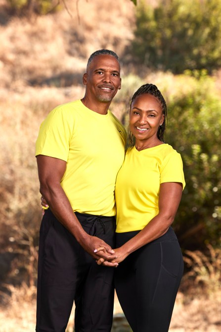 Derek and Sherisa Williams, a Black Couple wearing matching yellow shirts.