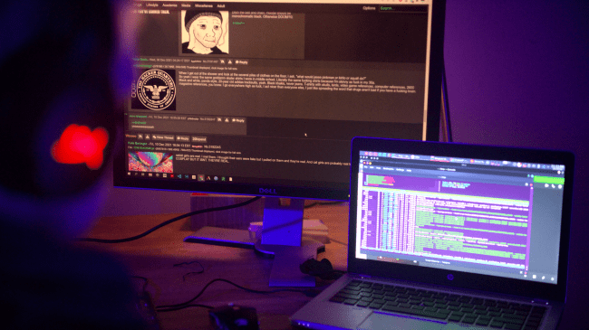 The Antisocial Network. Photograph of two computer monitors on a desk.