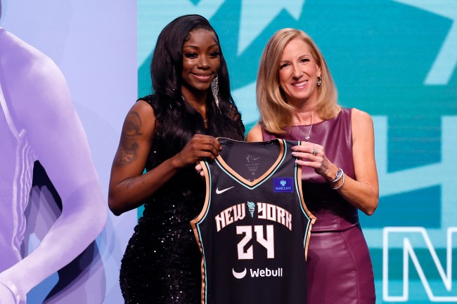 Marquesha Davis poses with WNBA Commissioner Cathy Engelbert after being selected 11th overall pick by the New York Liberty during the 2024 WNBA Draft at Brooklyn Academy of Music on April 15, 2024 in New York City.