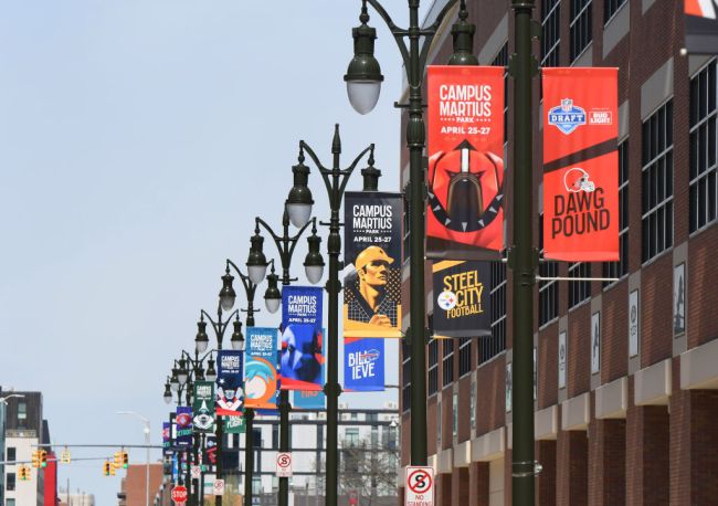 A general exterior view of Ford Field, home of the NFL Detroit Lions, with signs displayed on the light posts to announce the upcoming NFL draft. The draft is scheduled to be held around Campus Martius Park and Hart Plaza in Detroit, Michigan on April 25-27, 2024. Photo taken prior to the MLB game between the Detroit Tigers and the Texas Rangers at Comerica Park on April 18, 2024 in Detroit, Michigan.