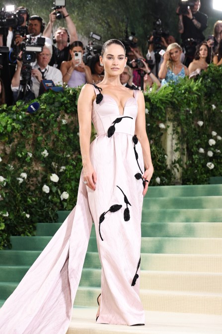 Lily James attends The 2024 Met Gala Celebrating "Sleeping Beauties: Reawakening Fashion" at The Metropolitan Museum of Art on May 06, 2024 in New York City.