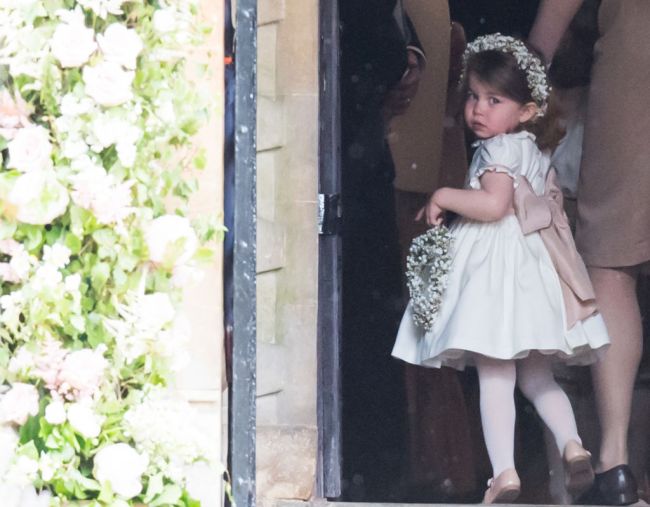Princess Charlotte of Cambridge attends the wedding Of Pippa Middleton and James Matthews at St Mark's Church on May 20, 2017 in Englefield Green, England.