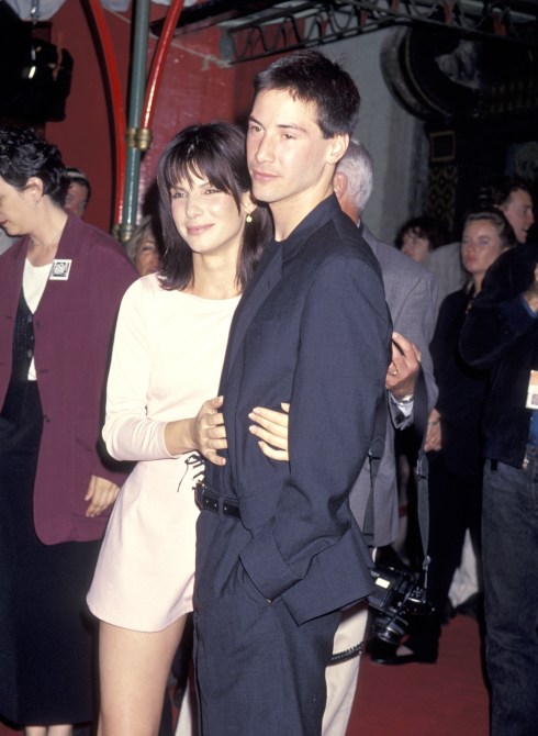 Sandra Bullock and Keanu Reeves attend the Speed premiere in 1994