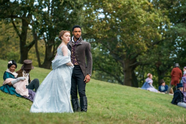 PHOEBE DYNEVOR as DAPHNE BRIDGERTON and REGÉ-JEAN PAGE as SIMON BASSET in episode 102 of BRIDGERTON
