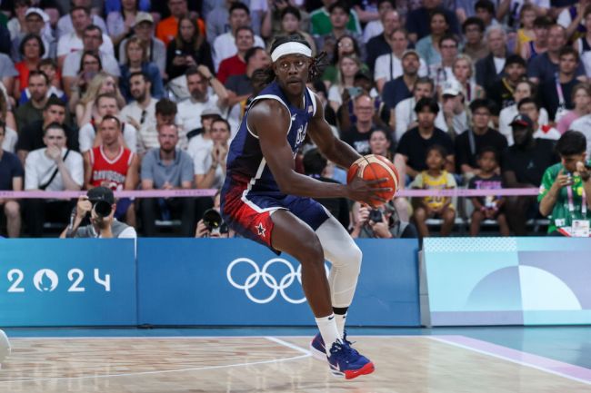 Jrue Holiday #12 of Team USA looks to pass the ball during the Men's Group Phase - Group C match between Serbia and USA on Day 2 of the Olympic Games Paris 2024 at Stade Pierre Mauroy on July 28, 2024 in Lille, France.