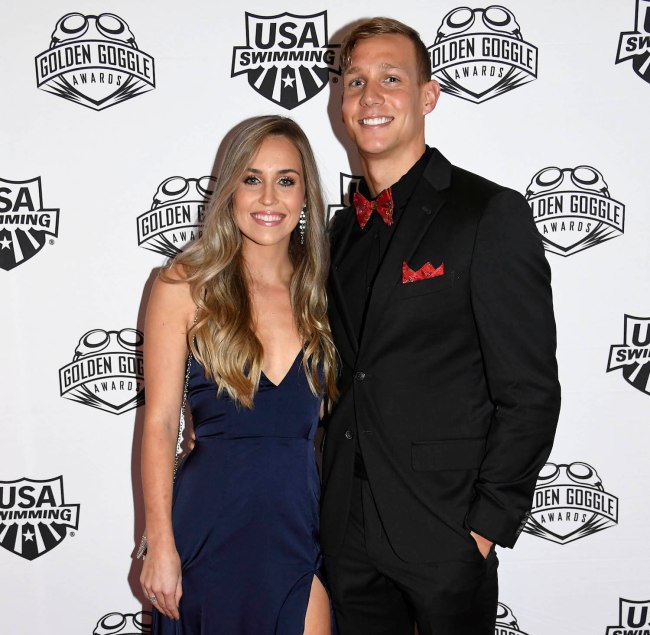 Swimmer Caeleb Dressel and Meghan Haila pose during Golden Goggle Awards on November 24, 2019 in Los Angeles, California.