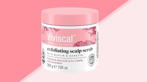 Viviscal Exfoliating Scalp Scrub on a pink striped background