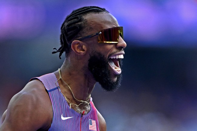US' Freddie Crittenden reacts as he crosses the finish line in the men's 110m hurdles repechage round of the athletics event at the Paris 2024 Olympic Games at Stade de France in Saint-Denis, north of Paris, on August 6, 2024.