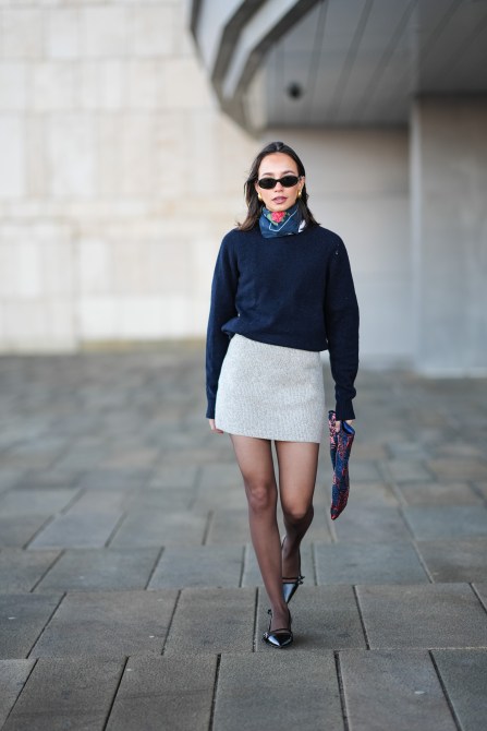 STYLECASTER | Minimalist Outfit Ideas, sweater, jeans, silk neck scarf