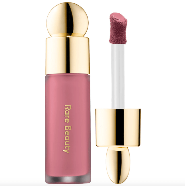 Rare Beauty Liquid Blush in Encourage in a clear tube.