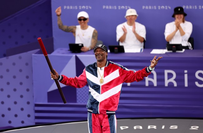 Snoop Dogg, performs the Coup de Baton ceremony prior to the Breaking Competition on day fourteen of the Olympic Games Paris 2024 at Place de la Concorde on August 09, 2024 in Paris, France.