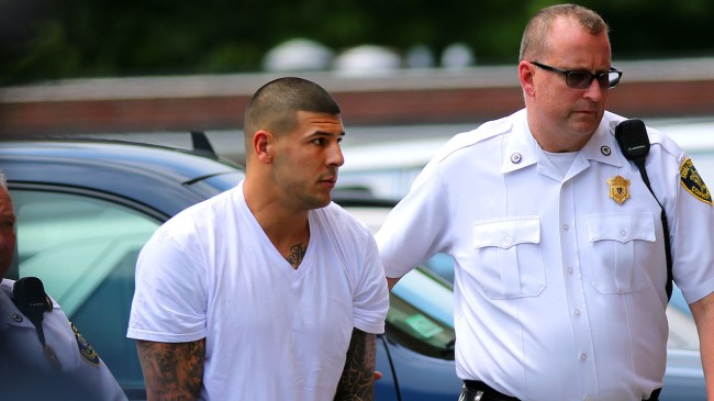 Former patriots player Aaron Hernandez is brought into Attleboro District Court where he was arraigned for murder.