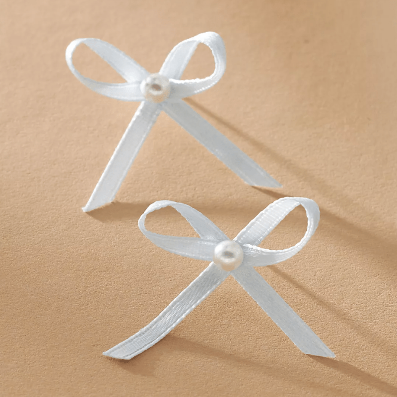 Earrings Trends 2024: Bows, Dangly Crystals, & More for Fall