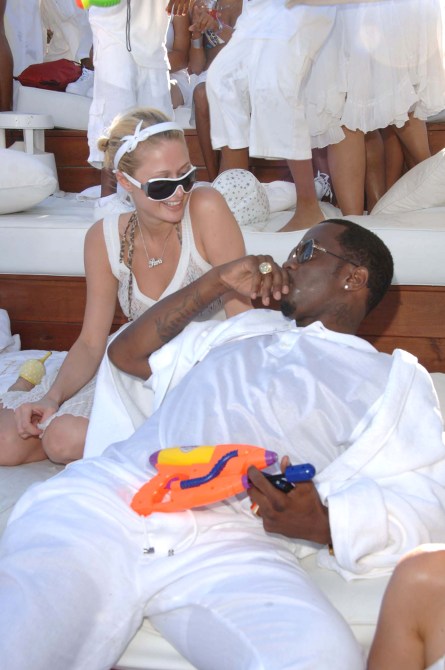 Paris Hilton and Sean "Diddy" Combs during Sean "Diddy" Combs White Party - Inside at Nikki Beach in St Tropez, France.