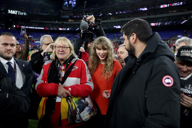 Taylor Swift is seen on the field with Donna Kelce, mother of Travis Kelce #87 of the Kansas City Chiefs after the Chiefs' 17-10 victory against the Baltimore Ravens in the AFC Championship Game at M&T Bank Stadium on January 28, 2024 in Baltimore, Maryland.