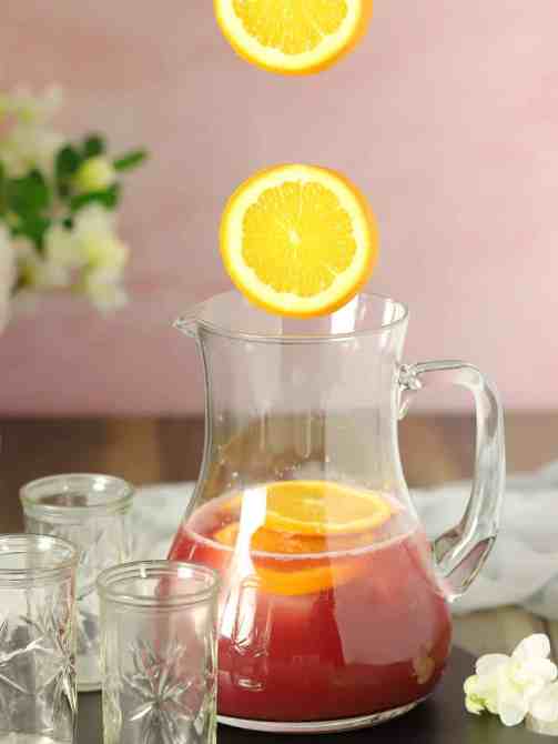 A pitcher of red sangria mocktail