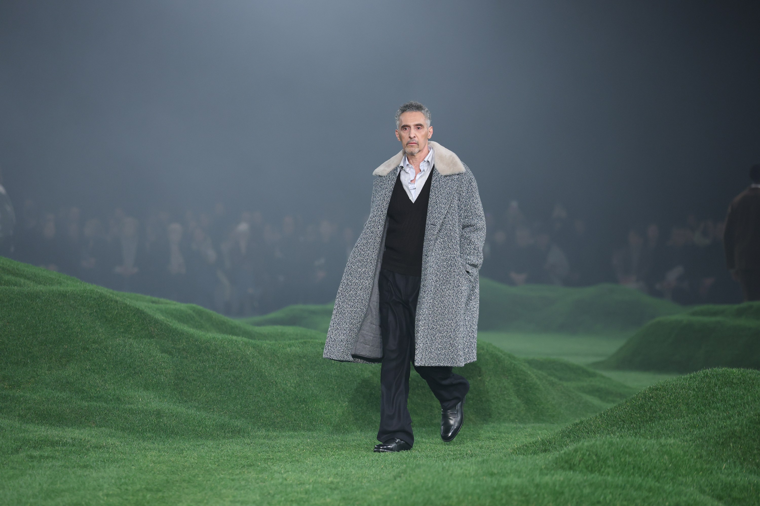 John Turturro walks the runway at the Zegna fashion show during the Milan Menswear Fall/Winter 2025 - 2026 Fashion Week on January 20, 2025 in Milan, Italy.