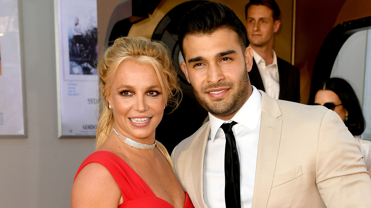 HOLLYWOOD, CALIFORNIA - JULY 22: Britney Spears (L) and Sam Asghari arrive at the premiere of Sony Pictures' "One Upon A Time...In Hollywood" at the Chinese Theatre on July 22, 2019 in Hollywood, California.