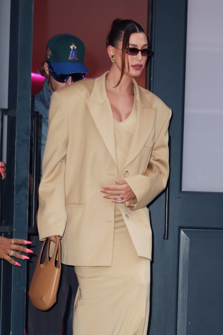 Hailey Bieber wearing red blush.