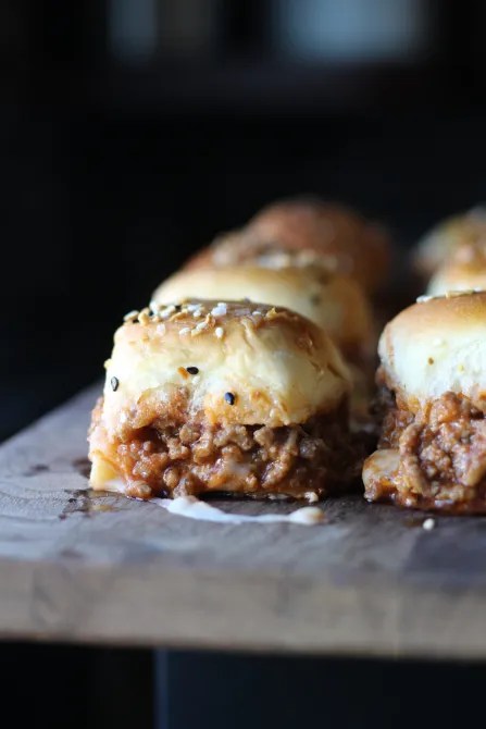 Several sloppy joes on a table