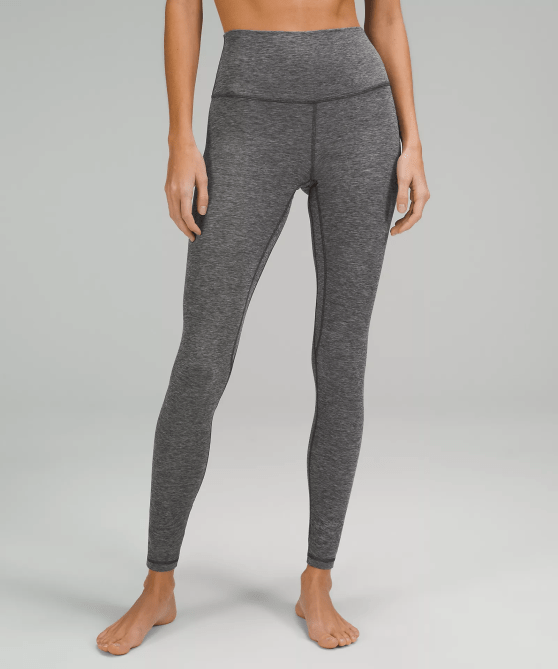 A model wearing the Lululemon Align High-Rise Pant 28" in heathered grey