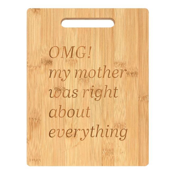 A wooden cutting board engraved with the text 'OMG! my mother was right about everything'