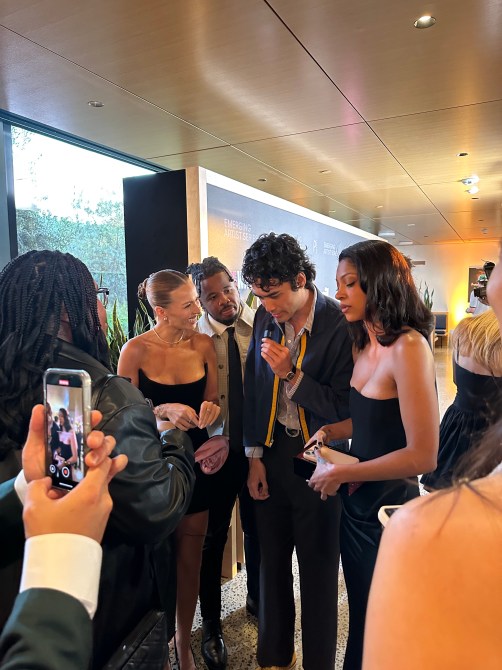 Serena Kerrigan gets interviewed at the premiere of "Older, Hotter, Wiser"