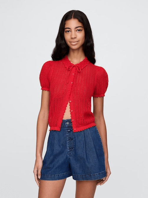 A model wearing the Gap x Dôen Linen-Blend Cardigan in bright red