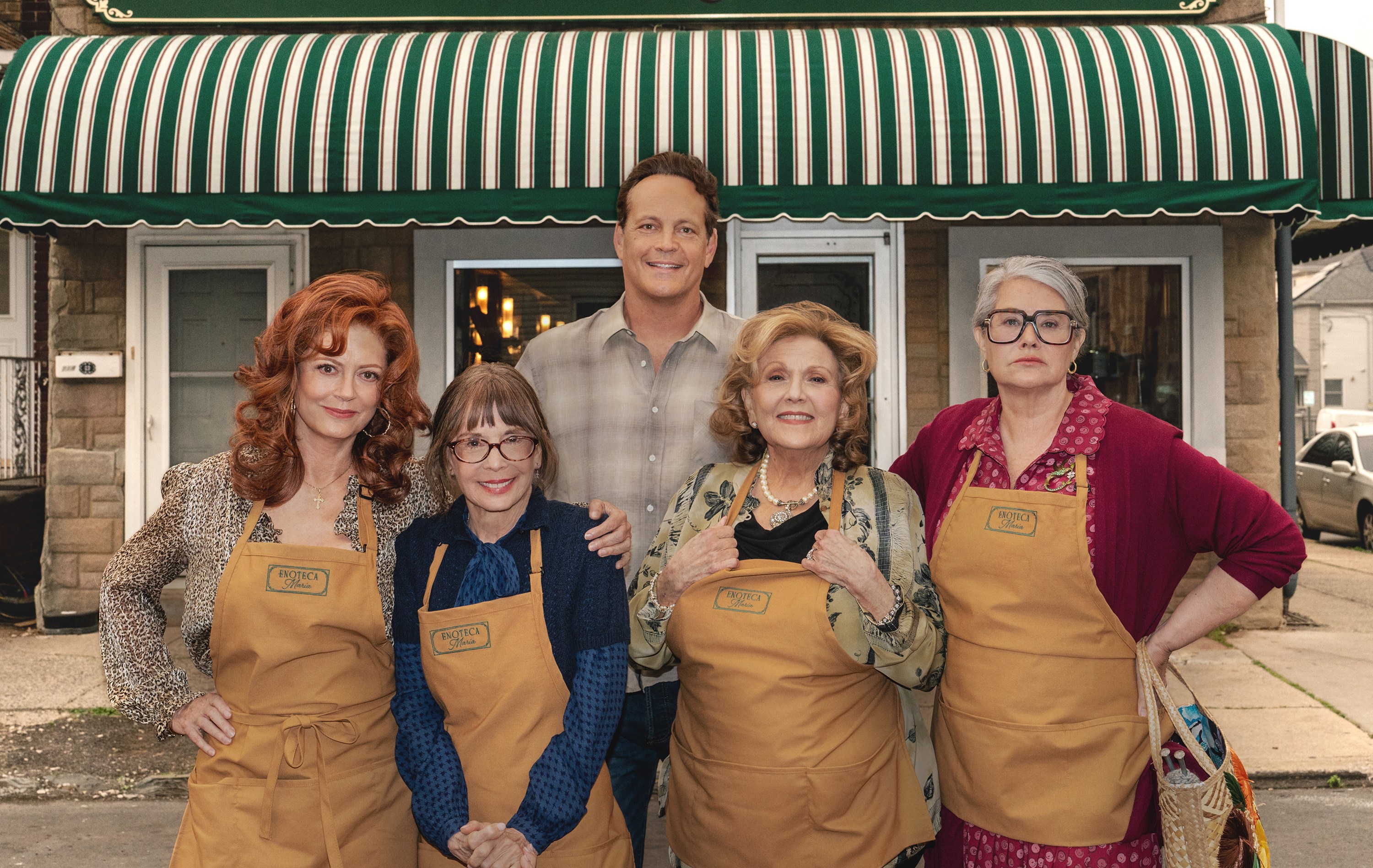 Nonnas. (L-R) Susan Sarandon as Gia, Talia Shire as Teresa, Vince Vaughn as Joe Scaravella, Brenda Vaccaro as Antonella and Lorraine Bracco as Roberta in Nonnas.