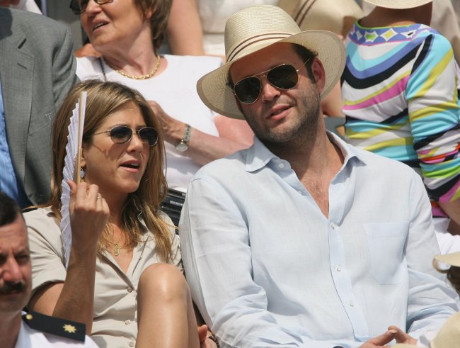 PARIS - JUNE 11:  Actress Jennifer Aniston and Actor Vince Vaughn attend the men's singles final between Roger Federer of Switzerland and Rafael Nadal of Spain during the French Open at Roland Garros on June 11, 2006 in Paris, France.
