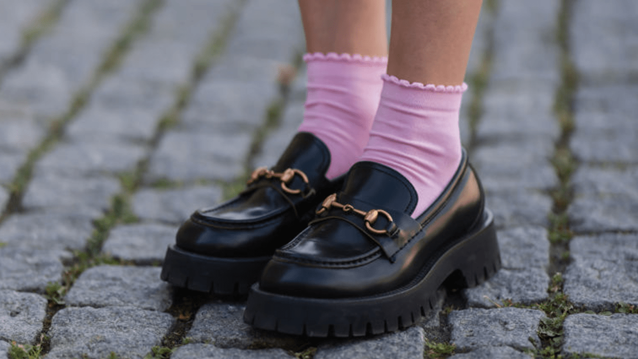 Lea Naumann wearing rose socks, Gucci black loafer on May 31, 2022 in Berlin, Germany.