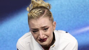 MILAN, ITALY - FEBRUARY 17: Amber Glenn of Team United States looks dejected in the Kiss and Cry zone after competing during the Women's Single Skating - Short Program on day eleven of the Milano Cortina 2026 Winter Olympic games at Milano Ice Skating Arena on February 17, 2026 in Milan, Italy.