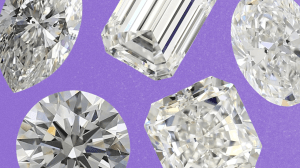 A purple background with loose diamonds
